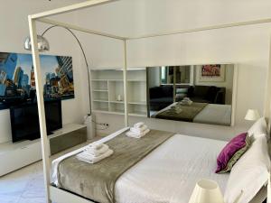 Postel nebo postele na pokoji v ubytování Casa del corso