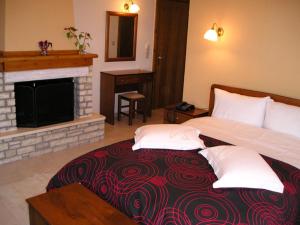 Ένα ή περισσότερα κρεβάτια σε δωμάτιο στο Hotel Ilianna 