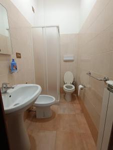 a bathroom with a sink and a toilet and a shower at La Locanda del Brigante in Farindola +32 photos