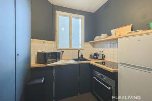 Køkken eller tekøkken på Flexliving - Room - Lamarck