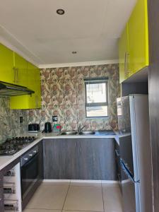 Η κουζίνα ή μικρή κουζίνα στο Mangenas Maison