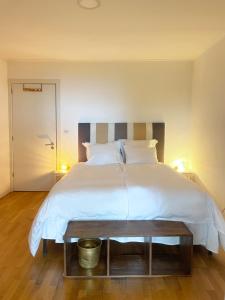 Postel nebo postele na pokoji v ubytování Villa Wisteria