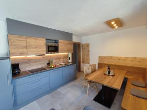 Kuchyň nebo kuchyňský kout v ubytování Apart Hotel Ideal