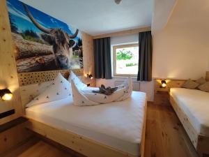 Postel nebo postele na pokoji v ubytování Apart Hotel Ideal