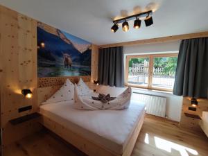 Postel nebo postele na pokoji v ubytování Apart Hotel Ideal