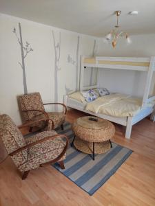 Postel nebo postele na pokoji v ubytování Apartmá U rybníčku