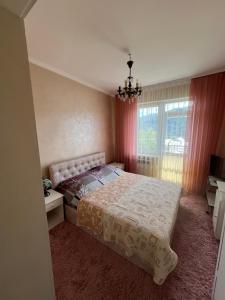 Posteľ alebo postele v izbe v ubytovaní Guest House Arnika