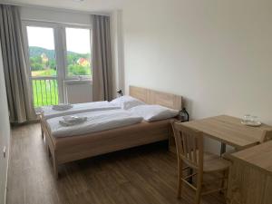hotel Manětín客房内的一张或多张床位
