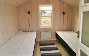 Postel nebo postele na pokoji v ubytování Holiday Home Bjerregårdsvej Vi