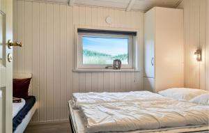 Postel nebo postele na pokoji v ubytování Holiday Home Bjerregårdsvej Vi