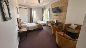 Postel nebo postele na pokoji v ubytování Isly Golf Hotel