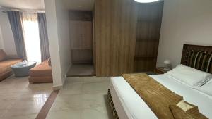 Postel nebo postele na pokoji v ubytování Isly Golf Hotel