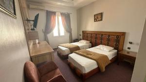 Postel nebo postele na pokoji v ubytování Isly Golf Hotel