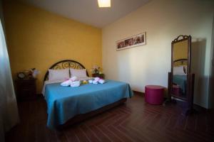 Postel nebo postele na pokoji v ubytování Volos Lux Apartment