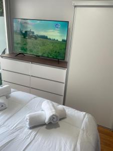 Ένα ή περισσότερα κρεβάτια σε δωμάτιο στο ManoloIII