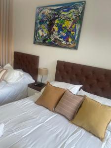 Ένα ή περισσότερα κρεβάτια σε δωμάτιο στο ManoloIII