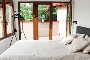 Postel nebo postele na pokoji v ubytování Sunset Home