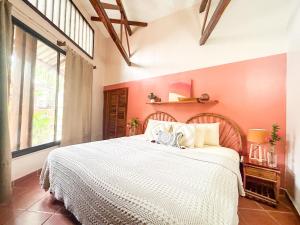 Кровать или кровати в номере Fenix Hotel - On the Beach