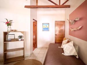 Кровать или кровати в номере Fenix Hotel - On the Beach