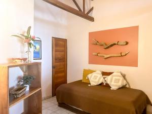 Кровать или кровати в номере Fenix Hotel - On the Beach