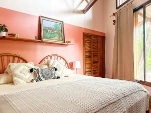 Кровать или кровати в номере Fenix Hotel - On the Beach