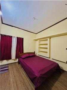 Postel nebo postele na pokoji v ubytování 4 Bedroom Jungle Villa