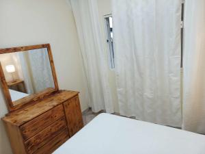 Postel nebo postele na pokoji v ubytování Vivenda Maria Helena