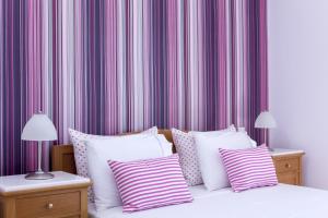 Letto o letti in una camera di Santellini Hotel