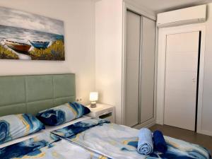 Posteľ alebo postele v izbe v ubytovaní Denia Mar Apartment - Mar Baltic 5