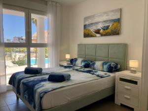 Posteľ alebo postele v izbe v ubytovaní Denia Mar Apartment - Mar Baltic 5