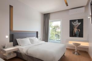 Posteľ alebo postele v izbe v ubytovaní Mirada Hotel + 37 fotografií