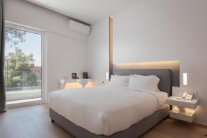 Postel nebo postele na pokoji v ubytování Mirada Hotel