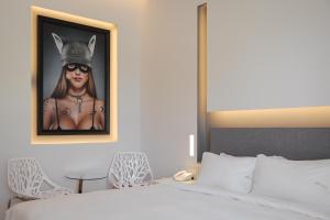 Postel nebo postele na pokoji v ubytování Mirada Hotel
