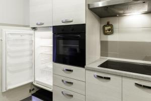 Cucina o angolo cottura di IN FIERA 8 Apartment superior