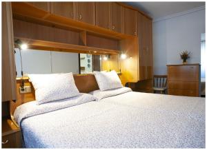 Katil atau katil-katil dalam bilik di Llanos Relax VUT 5578 AS