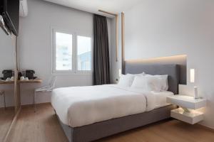 Postel nebo postele na pokoji v ubytování Mirada Hotel