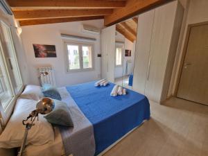 Ένα ή περισσότερα κρεβάτια σε δωμάτιο στο LA CASA DI ALICE