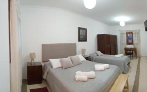 เตียงในห้องที่ Las Tejuelas - B&B Patagónico