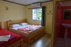 Postel nebo postele na pokoji v ubytování Campchamao