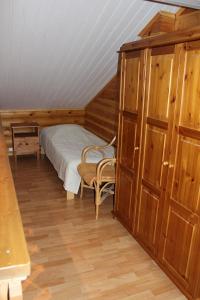 Кровать или кровати в номере Rinnetupa Apartment
