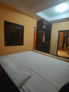 Postel nebo postele na pokoji v ubytování Cataleya Hostel