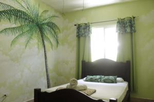Postel nebo postele na pokoji v ubytování Cataleya Hostel