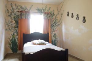 Postel nebo postele na pokoji v ubytování Cataleya Hostel