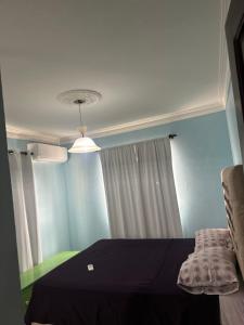 Postel nebo postele na pokoji v ubytování SUNSET 2 Bedroom Apt