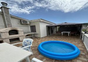 Πισίνα στο ή κοντά στο Sun All Day