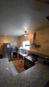 Kuchyň nebo kuchyňský kout v ubytování Cataleya Hostel