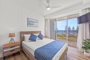 Postel nebo postele na pokoji v ubytování Aquarius Resort + 37 fotografií