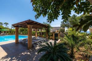 Kolam renang di atau dekat dengan Chalet 'Cala Murta' mit eigener Terrasse