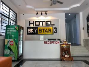 a hotel sky star sign on a wall in a lobby at Sky Star 3 Hotel in Can Tho