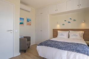 Postel nebo postele na pokoji v ubytování Vila Luz Mar